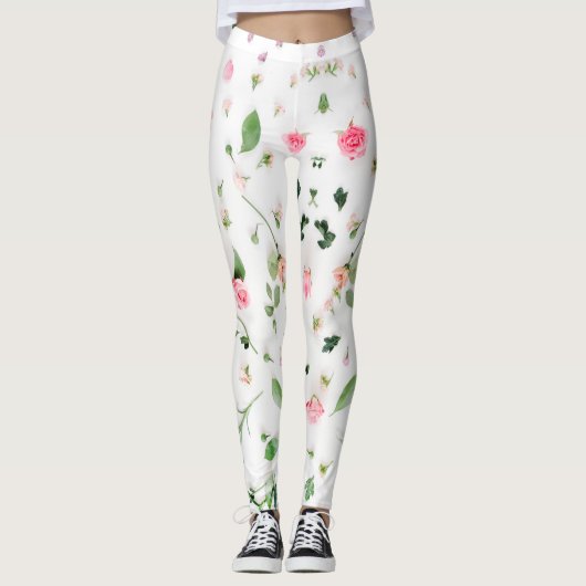 Roze roos en bladeren op witte achtergrond leggings (Voorkant)