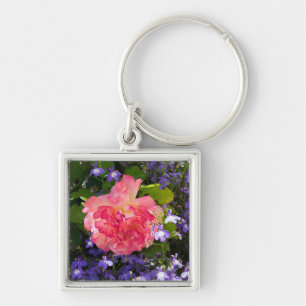 Roze roze bloemen onder blauwe lobebelia bloemen p sleutelhanger