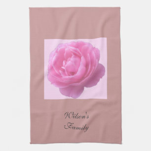 roze rozenbloem met familienaam theedoek