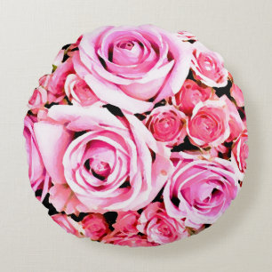 Roze rozenboeket rond kussen