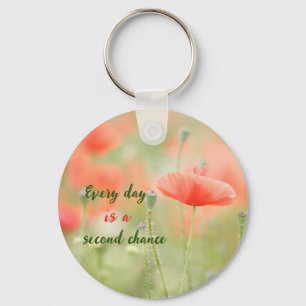 Roze sleutelhanger van bloemen