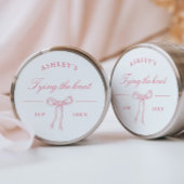 Roze strik die de knoopgunst bindt ronde sticker