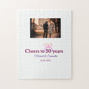 Roze strik viert 50-jarig huwelijksjubileum  legpuzzel
