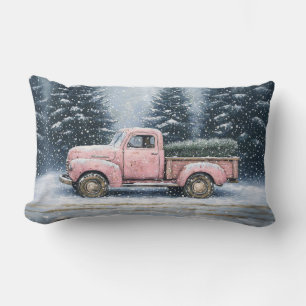 Roze truck die een kerstboom vervoert kussen