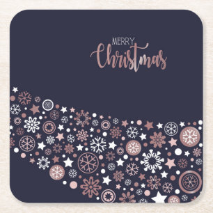 Roze witte sneeuwvlokken in blauwe achtergrond vierkante kartonnen onderzetter