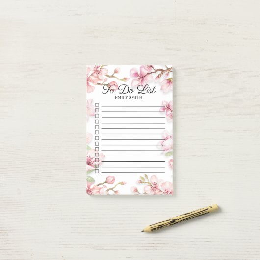 Roze, witte, vlentevlinnendoos om te doen post-it® notes (Op bureau)