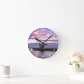 Roze zonsondergang over het meer ronde klok (Huis)