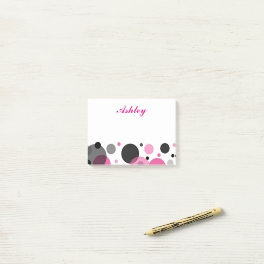 Roze zwarte stip post-it® notes (Op bureau)