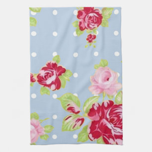 Rozen op de blauwe keukenhanddoek