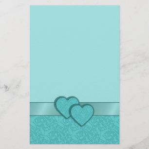 Ruban de satin de turquoise et papeterie de coeurs