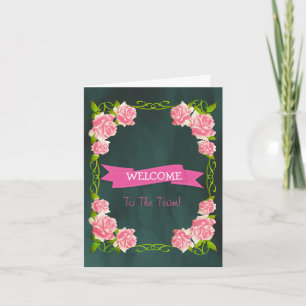 Ruban rose avec carte de bienvenue à bordure blanc