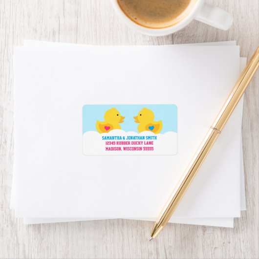 Rubber met roze roze of blauw geslacht met feestda etiket (Insitu)