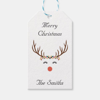 Rudolph avec les étiquettes de la couronne de fleu