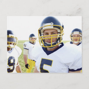 rugbyspeler met helm en staande briefkaart