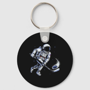 Ruimtehockey-astronaut speelt in zwaartekracht nul sleutelhanger