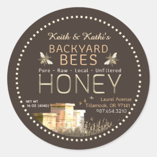 Rundbijenkorven en kleine bijen op donkerbruin ronde sticker