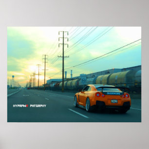 "Rust" Nissan GT-R in industriegebied op zonsonder Poster