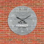 Rustic Gray Wood Couple Wedding Anniversary<br><div class="desc">Wedding clocks to personalize with new couple last name. The rustic gray wood background adds a country chic look. Un grand poison pour le weddings et le nouveau foyer.</div>