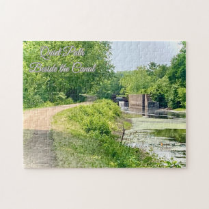 Rustig pad naast het kanaal legpuzzel