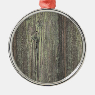 Rustige, donkere, weetherde houten achtergrond metalen ornament