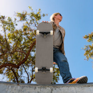 Rustige & eenvoudige visuele paarse textuur achter skateboard