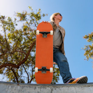 Rustige en eenvoudige oranje textuur achtergrond skateboard