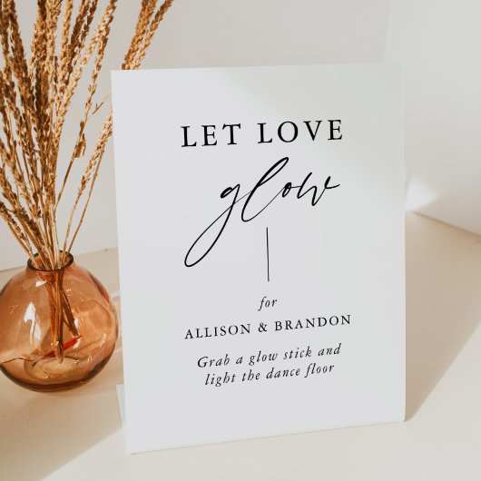 Rustige kalligrafie laat je liefhebben op gloedwed reclamebord met voetstuk