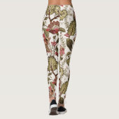 Rustige Paisley-bloem op crèmeachtergrond Leggings (Achterkant)