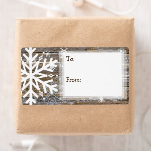 Rustisch hout en neusvlokken naar en van etiket (Insitu)