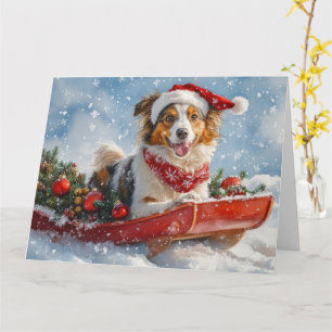 Ruwe Collie-hond in slee Laat het sneeuwen Kerstmi Kaart