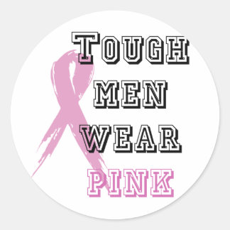 Ruwe mannen draag roze ronde sticker