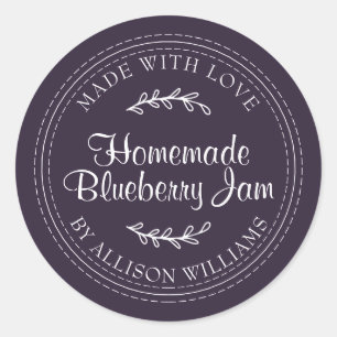 Ruwe zelfgemaakte bosbessenjam inmaken donkerpaars ronde sticker