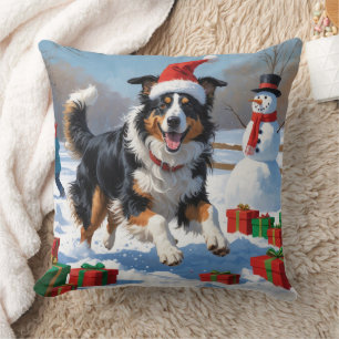 Ruwharige Collie Rent in Sneeuw met Kerstmuts Kussen