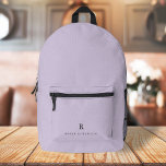 Sac À Dos Imprimé Élégant Sophisticé Classic Monogram Lilac<br><div class="desc">Un design mininaliste élégant avec une typographie classique initiale et nom en noir sur un pastel lilas lavender violet arrière - plan. L'accessoire personnalisé parfait qui est facile à customiser pour toute occasion!</div>