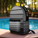 Sac À Dos Imprimé Motif de bande rétro noir gris vintage vibe<br><div class="desc">Ajoutez votre nom à ce design masculin avec des rayures audacieuses. Un design rétro avec une police d'inspiration les années 70 et un motif minimal. Toutes les couleurs peuvent être modifiées. Créez le vôtre et changez les couleurs en votre combinaison préférée.</div>