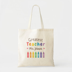 Sac à main de professeur avec crayons de coloriage