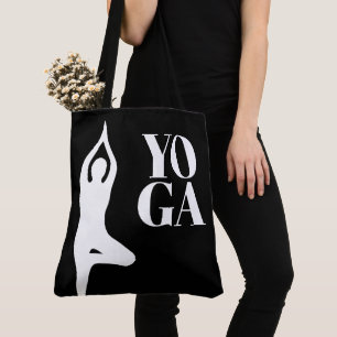 Sac à main noir silhouette de pose d'arbre de yoga