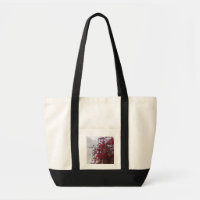 Sac à main vibrant rouge de photographie de fleurs