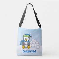 Petit pingouin assis avec boules de neige carrosse