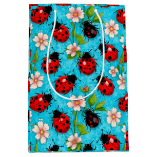 Sac Cadeau Moyen Motif de coccinelle colorée avec des fleurs