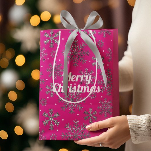 Sac Cadeau Moyen Noël rose élégant avec des flocons de neige élégan