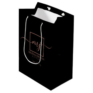 Sac Cadeau Moyen Rose Gold Élégant sur Fond Noir