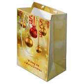 Sac Cadeau Moyen Rouge et babioles de Noël d'or (Devant Angle)