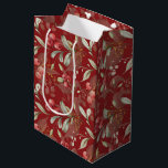 Sac Cadeau Moyen Rouge foncé Élégant verdure Noël botanique<br><div class="desc">Conçu dans des couleurs de Noël intemporelles de rouge riche, de vert vif et d'ivoire élégant, ce sac respire le charme des vacances. L'arrière - plan rouge foncé personnalisé ajoute une touche de sophistication, ce qui fait de votre cadeau un véritable démarque. Ce sac cadeau polyvalent est la touche finale...</div>