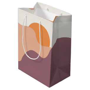 Sac Cadeau Moyen Soleil descend derrière les collines pourpres
