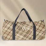 Sac De Sport Élégant monogramme motif en plaid beige<br><div class="desc">Voici le sac à dos Monogram Duffel Motif conçu par PixeliaDesigns, où la mode rencontre la fonctionnalité. Dotée d'un design plaid intemporel dans des tons beiges sobres, cette lunette est surélevée d'un monogramme personnalisé dans une police sophistiquée, qui s'adresse à la fois aux hommes et aux femmes. Parfait pour une...</div>