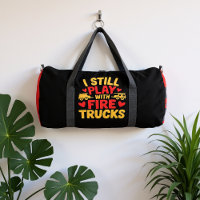 Je joue encore avec des camions de pompiers