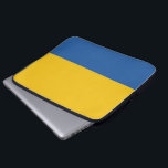 Sac d'ordinateur portable bleu et jaune<br><div class="desc">Portez votre ordinateur portable avec style dans ce coque bleu et jaune.</div>