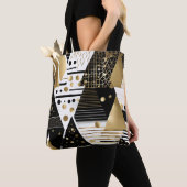 sac fourre-tout abstrait en or et triangles noirs (De près)