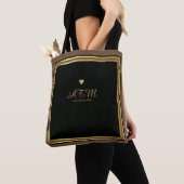 sac fourre-tout marron monogrammé avec coeurs faux (De près)